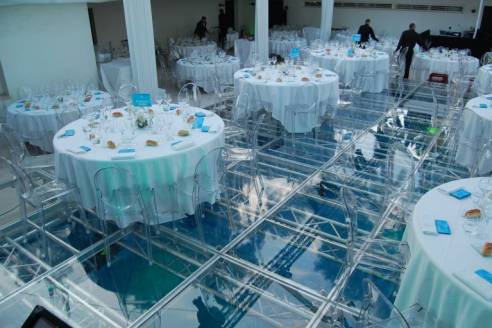 Covered Pool used as an additional Dining Area dance floor on swimming pool wedding